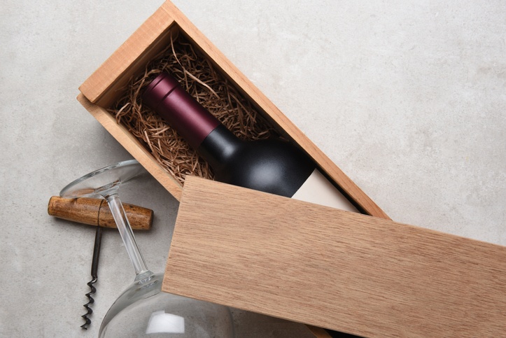 Cabernet in a wood box partially covered by its lid