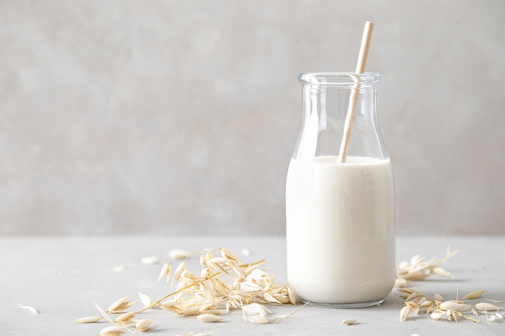 Oat milk. Delicious and healthy vegetarian alternative milk drink. Non-dairy milk