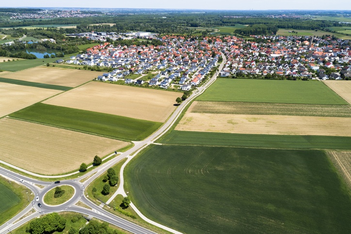 Traffic Circle, Roads, Fields and Town, Aerial View