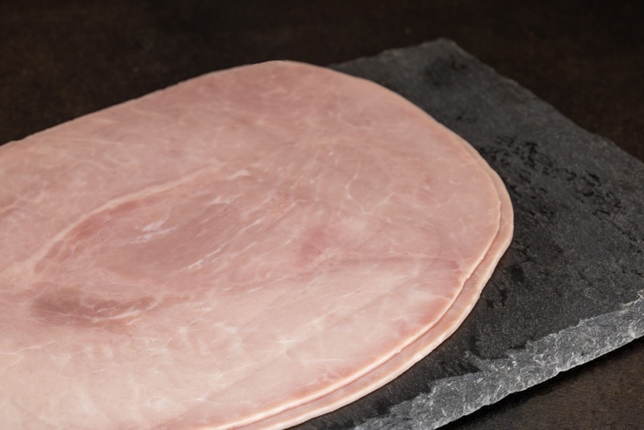 slices of White Ham from Paris on a slate cutting board